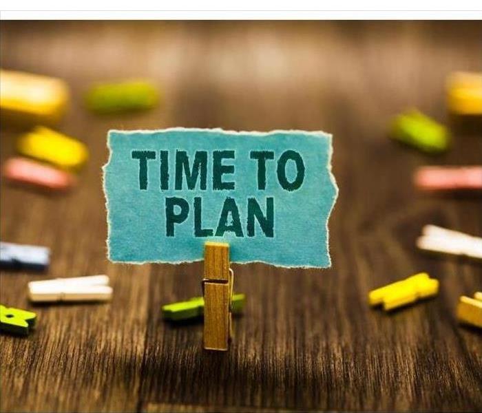 clothing pin holding a note that says TIME TO PLAN