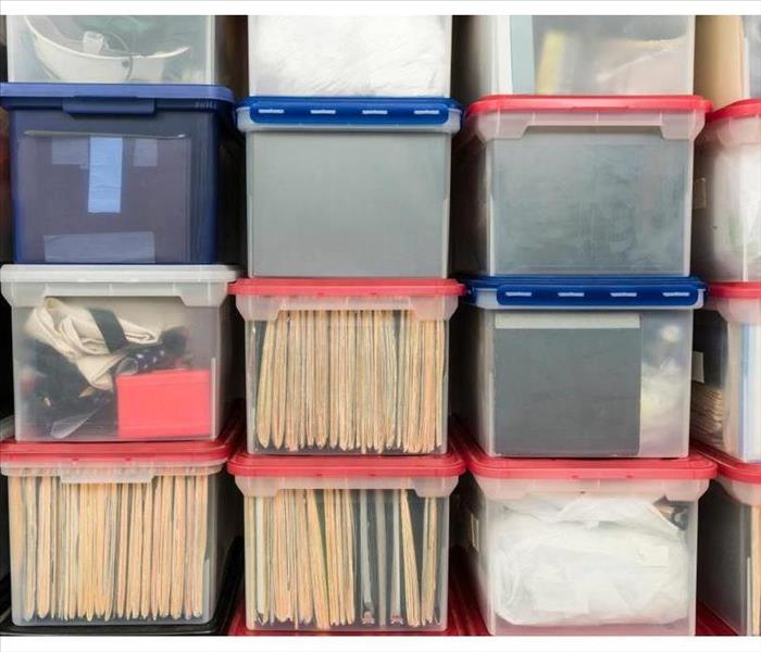 Documents inside plastic bins